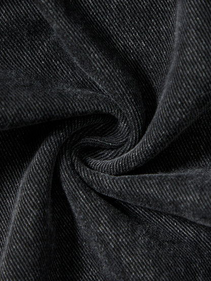 Men's black jeans. With a design of (ripped holes) and tassels. In a street trend style.